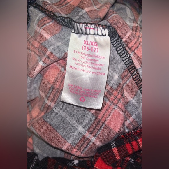 Red and black plaid flared stretch pants. - Picture 2 of 2